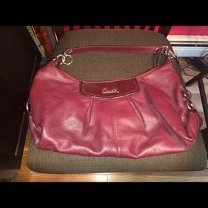 Wine color Coach Hobo bag in excellent condition.
